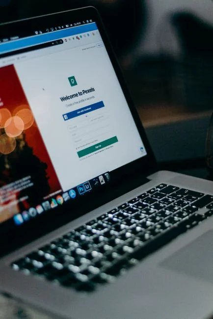 A laptop displaying an online checkout form, highlighting technology and e-commerce.